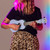 Lifestyle image of the Mad About Lavender Blue soprano ukulele being played. Lightweight beginner ukulele with carbon strings, geared tuning pegs and a compact 21-inch design, ideal for children, students and first-time players learning chords, strumming and basic techniques.