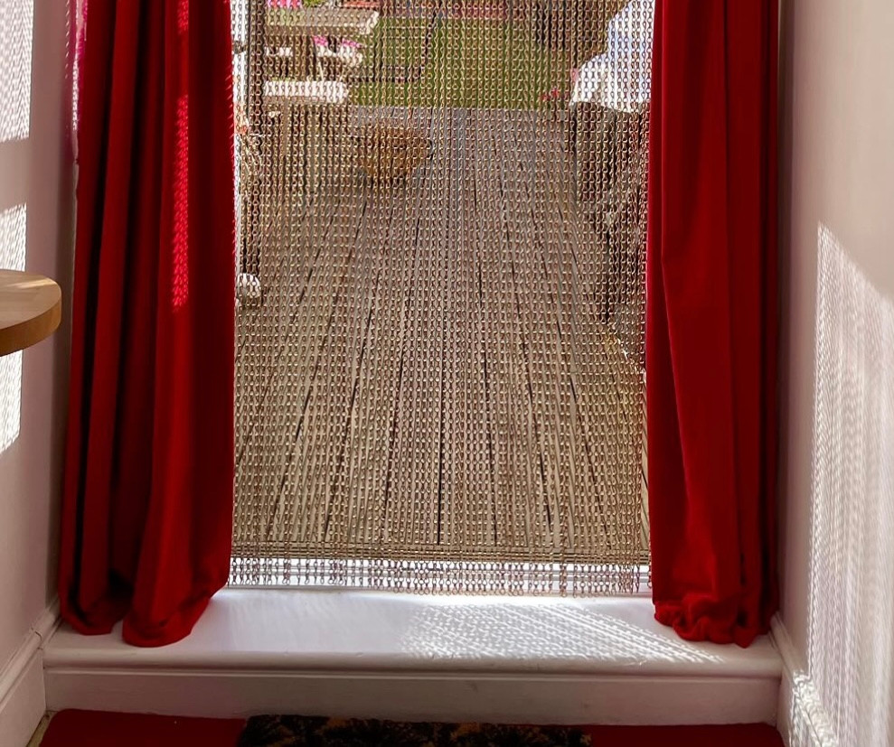 Upgrade your pest control solutions with our chain screens, designed to keep flies and insects at bay. Perfect for both residential and commercial use, this high-quality fly screen ensures a pest-free environment while allowing fresh air to flow through. Crafted with durable materials and available in a variety of colors, our chain screens offer both functionality and aesthetic appeal. Order your custom chain screen today and experience the ultimate in pest control. This chain screen was order by out customer who wanted to keep her doors opening to allow fresh air while gardening. Bronze chain complements her decor and allows her to enjoy pest free living in her kitchen and sitting room. Made to measure and dispatched within 1-2 days, our screens will prevent flies, bugs, insects, bees, wasps and even birds from entering your property. Upgrade your pest control solutions with our chain screens, designed to keep flies and insects at bay. Perfect for both residential and commercial use, this high-quality fly screen ensures a pest-free environment while allowing fresh air to flow through. Crafted with durable materials and available in a variety of colors, our chain screens offer both functionality and aesthetic appeal. Order your custom chain screen today and experience the ultimate in pest control. This chain screen was order by out customer who wanted to keep her doors opening to allow fresh air while gardening. Bronze chain complements her decor and allows her to enjoy pest free living in her kitchen and sitting room. Made to measure and dispatched within 1-2 days, our screens will prevent flies, bugs, insects, bees, wasps and even birds from entering your property.