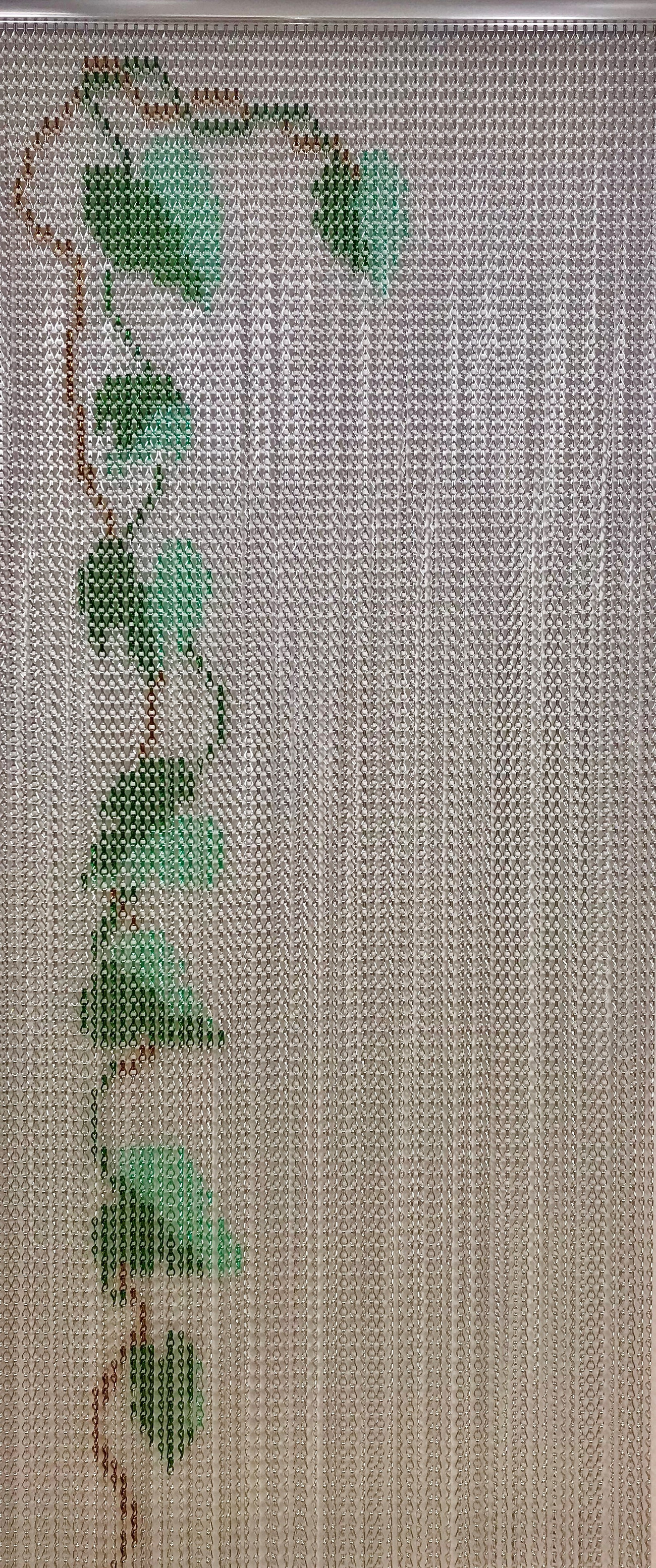 Vine Patterned Chain Screen. This screen has a mix of standard and premium colours to create a vine pattern on a silver background. This can be used in pest control or as a design screen inside or externally. We can supply screens in 2 widths - 76cm x 198cm or 90cm x 210cm. The length can be adjusted to suit your door opening.