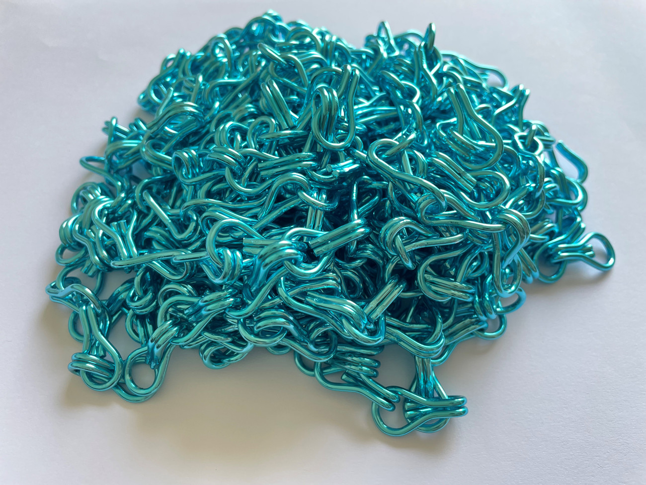 Turquoise Premium Aluminium Chain. This colour is exclusive to the UK market here at Sway Screens. Made from high quality commercial grade aluminium , This chain offers the highest level of protection in chain screens for pest control but can also be used in design projects. Supplied in boxes that can be dispatched same day if ordered before 1pm, This chain can be used indoors or outdoors to stop flies and insects from entering you home or business.