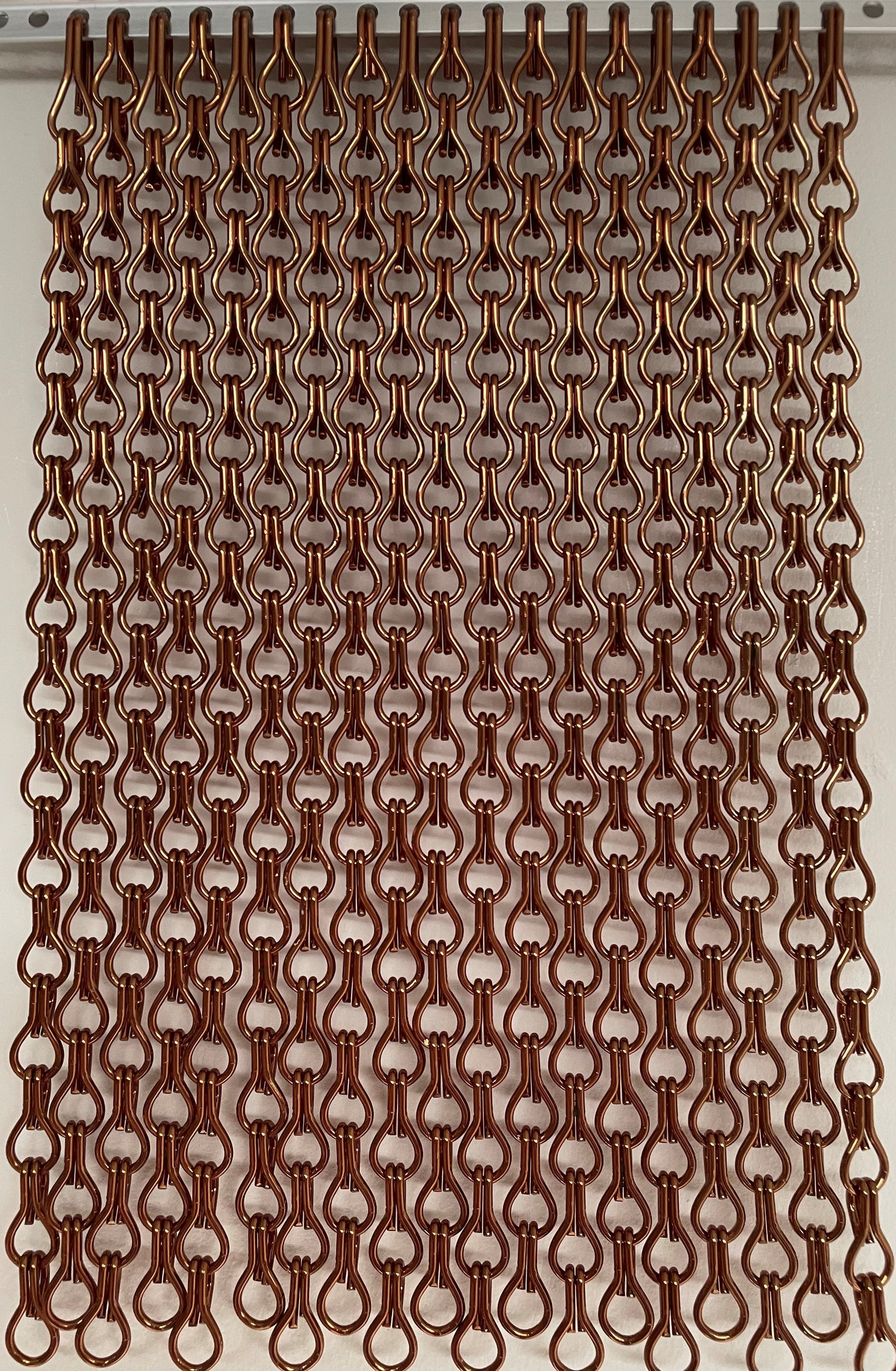 Bronze Close Knit. The pattern on the screen is made due the density of the screen being 22% more than a standard chain screen offering more protection.