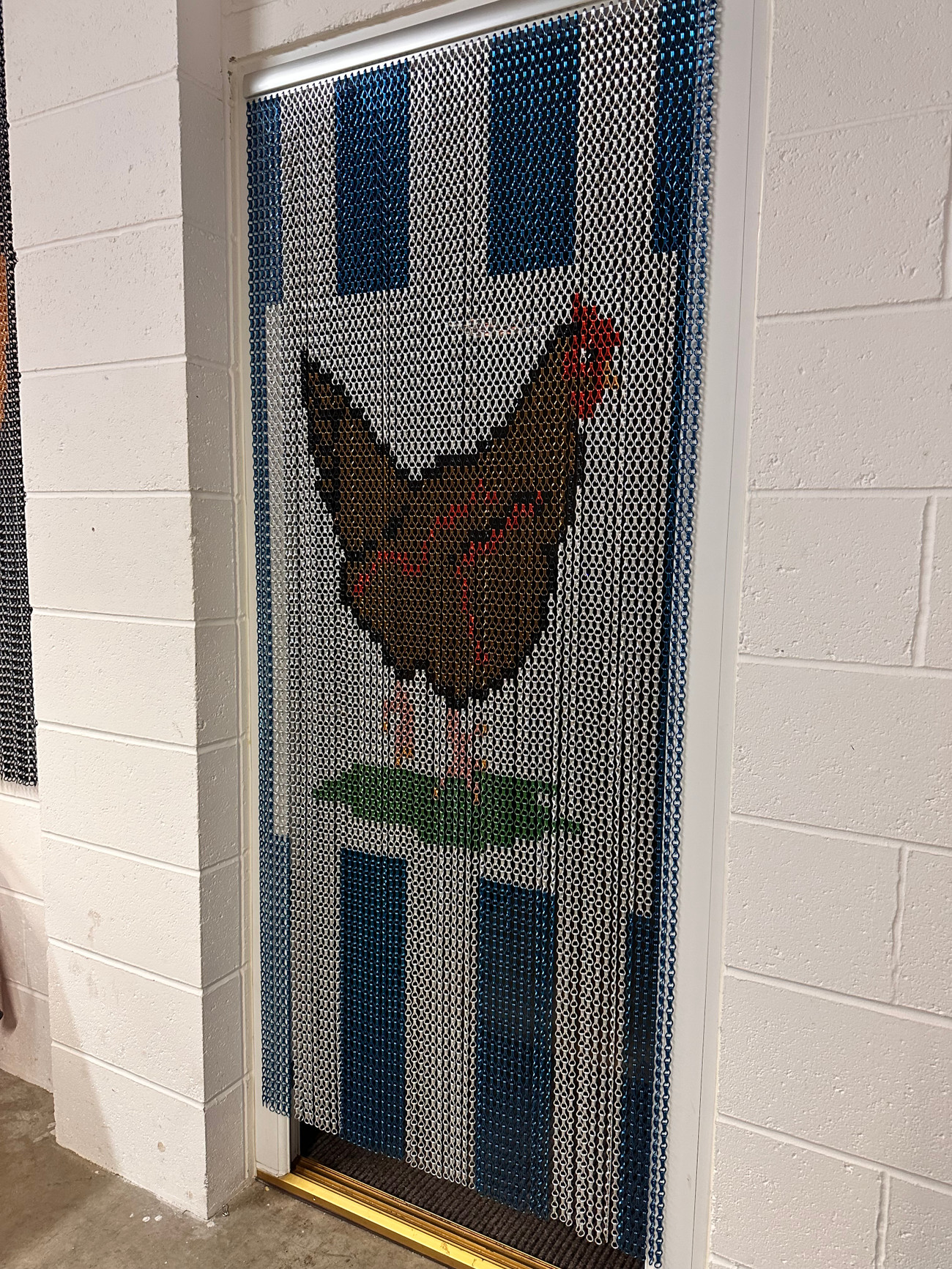 Chicken ! At Sway Screens we can create a variety of images on your chain screen for any location. Our customer ordered 2 chain screens for their butchers shop but wanted different animals on each. We came up with this chicken ! Enhance your butcher shop's hygiene and pest control with our Chicken Chain Screen, specifically designed to keep flies, bugs, and other pests out. This durable and functional screen is perfect for maintaining a clean and professional environment in your shop. Ideal for front-of-house use, the Chicken Chain Screen ensures a pest-free zone while allowing for easy access and airflow. Crafted for maximum effectiveness, this screen is an essential addition to any butcher shop dedicated to cleanliness and customer satisfaction. Upgrade your pest control solutions with our high-quality Chicken Chain Screen today