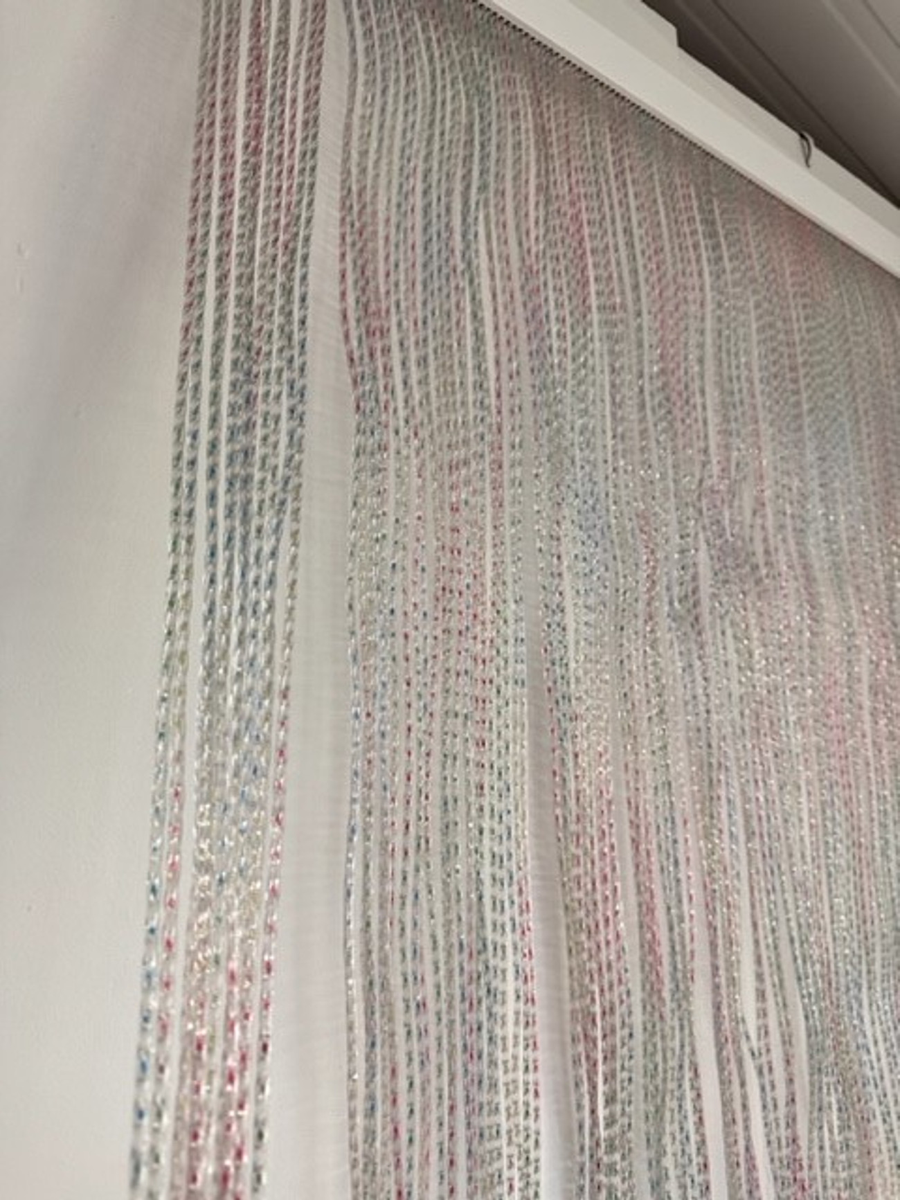 Multi coloured PVC Strand screen with coloured filament.  Designed for domestic and commercial use our PVC screens can be used indoors and outdoors.