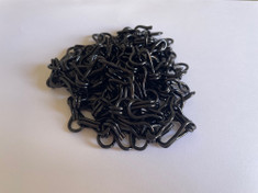 Black Aluminium Chain. Can be used indoors and outdoors for pest control or design work. This chain is anodised and will not rust. It can be purchased by the metre or in 600m boxes. This chain is typically used as a repair and replace for strands on screens or to create patterns in a DIY project.