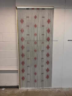 Silver chain fly screen with a red diamond design. This screen can be used indoor and outdoor and is made with high grade aluminium chain which gives the best protection against flies, bees, wasps and other pests that you don't want to enter your property