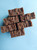Hot process production gives this soap a lovely rustic style.
Image shows top view of 6 bars of soap.