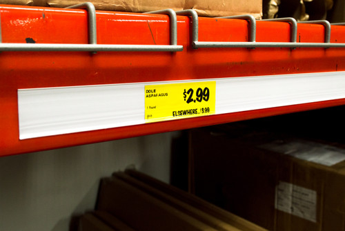 White adhesive price channel and ticket holder attaches to any smooth flat surface. Clear print protector keep tickets looking new and allows for tickets to be loaded from top.