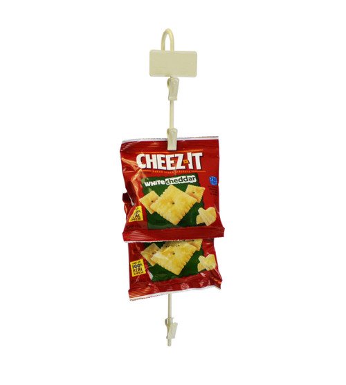 Metal merchandising clip strip with 6 stations for hanging products to increase cross-selling and up-selling.