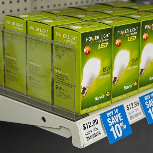 LED light bulb boxes displayed on a retail shelf with price and discount tags