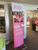 Three-tier poster stands work great for displaying pillow case style graphics.