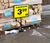 A wooden fence with a sign on it