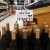 Bottle top promotional sign holder clip. Fits over the neck of bottles for secure display of tags and signs.