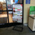 Premium poster stand 22 x 28 being used with a metal wire basket brochure holder