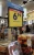 A sign for a food stand in a grocery store