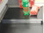 Checkout lane divider on grocery conveyor belt. 16"L x 1"H x 1"W