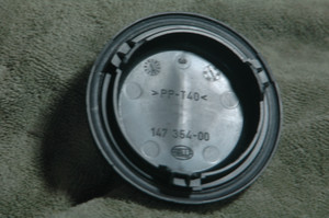 BMW 63117204272 OEM 63-11-7-204-272 Used Xenon Bulb Cover HEADLIGHT 4 IN HELLA 147 354-00 PP-T40 FITS: 2008-2013