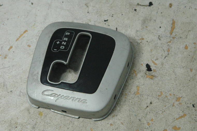 36 - DH Porsche 9555522610162W (USED) 955-552-261-01-62W OEM SHIFTER COVER SILVER - NO ELECTRONICS 2003-2010 FROM: 2006 Porsche Cayenne 4dr 6-Spd Manual
