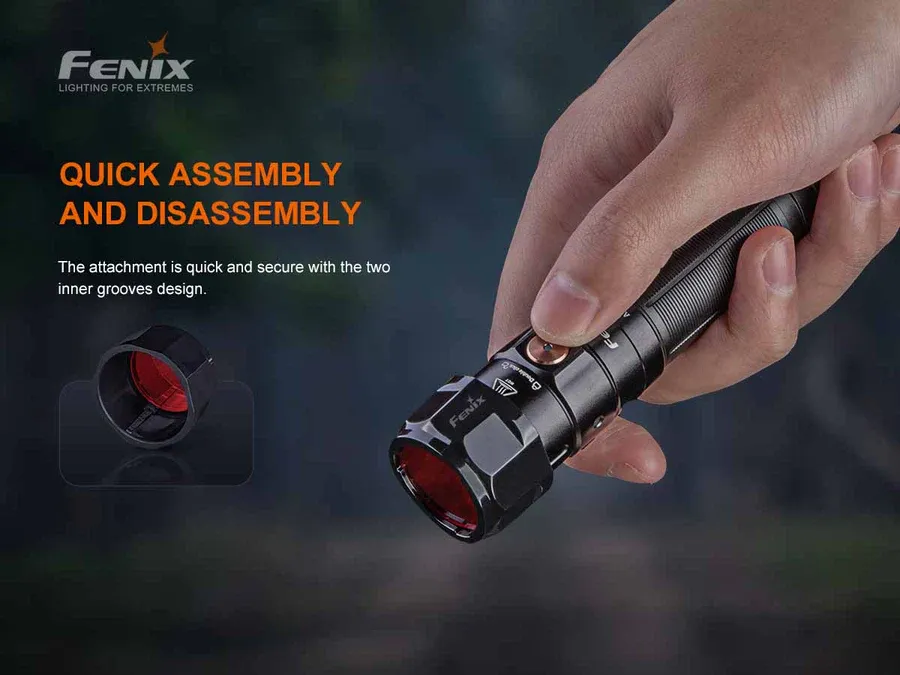 Hand attaching the Fenix AOF-S+ V2.0 - Red Filter to a Fenix flashlight, demonstrating quick assembly.