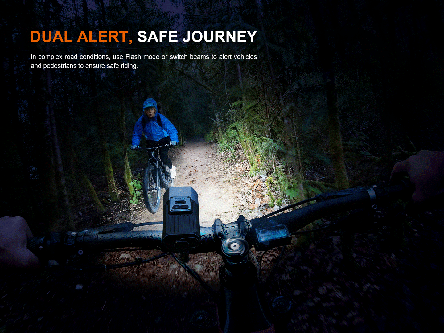 Fenix BC45R bicycle light's powerful beam illuminating a fellow cyclist on a dark forest trail.