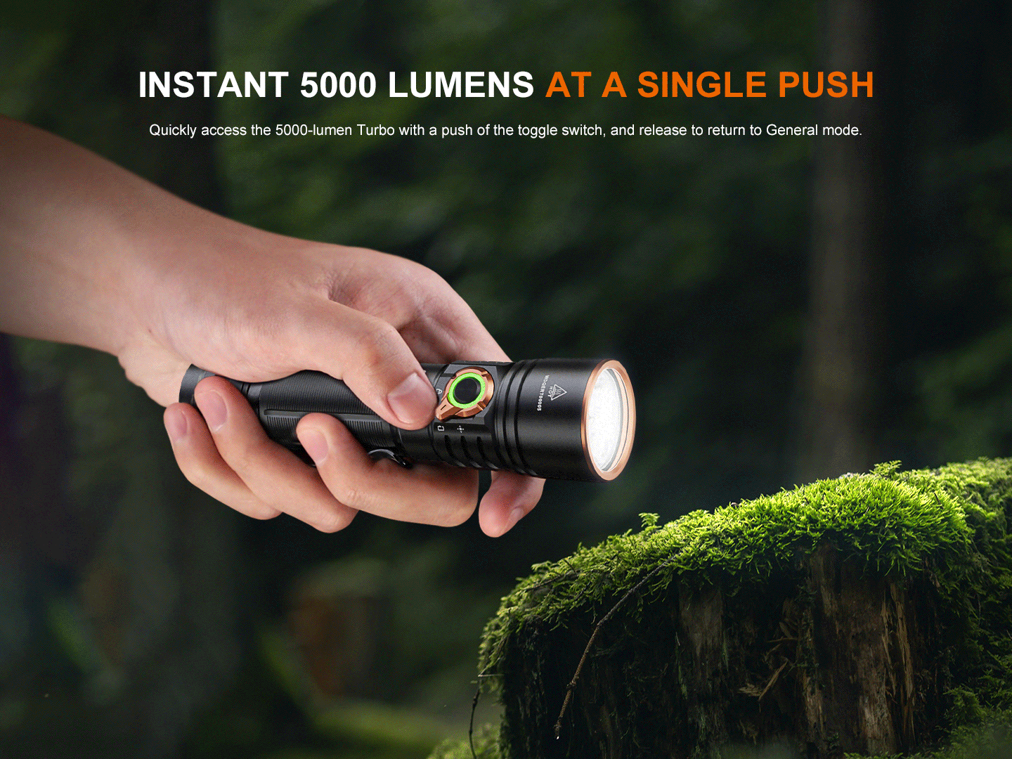 Hand holding the Fenix E40R - 5000 Lumen Rechargeable EDC Torch, pressing the switch for instant 5000 lumens.