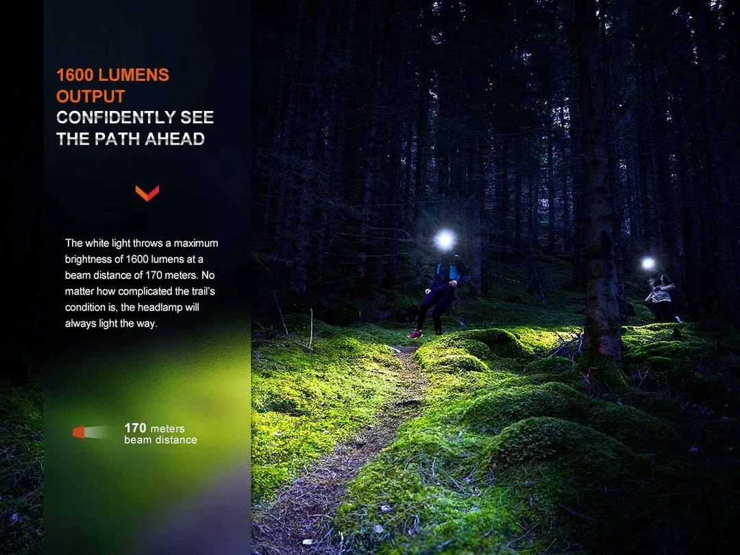 Two people trail running in a dark forest, illuminated by Fenix HM65R-T V2.0 Dual output 1600 lumen USB-C rechargeable headlamps.