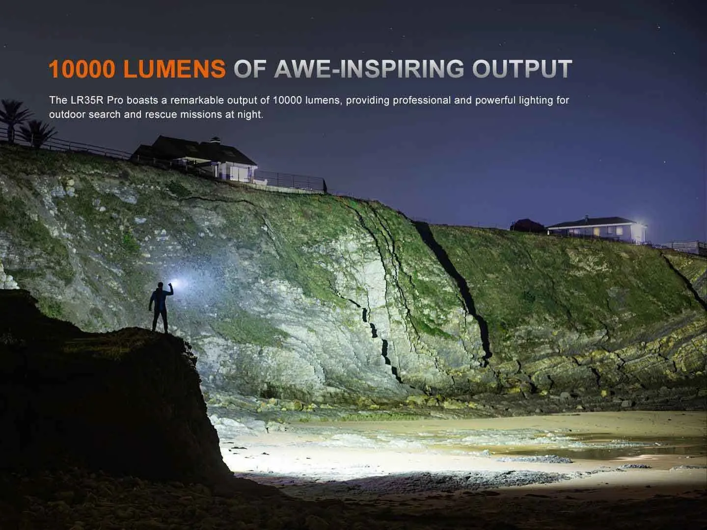 Fenix LR35R Pro - Flood and Spot 10000 Lumens 500m throw LED Searchlight illuminating a cliff at night.
