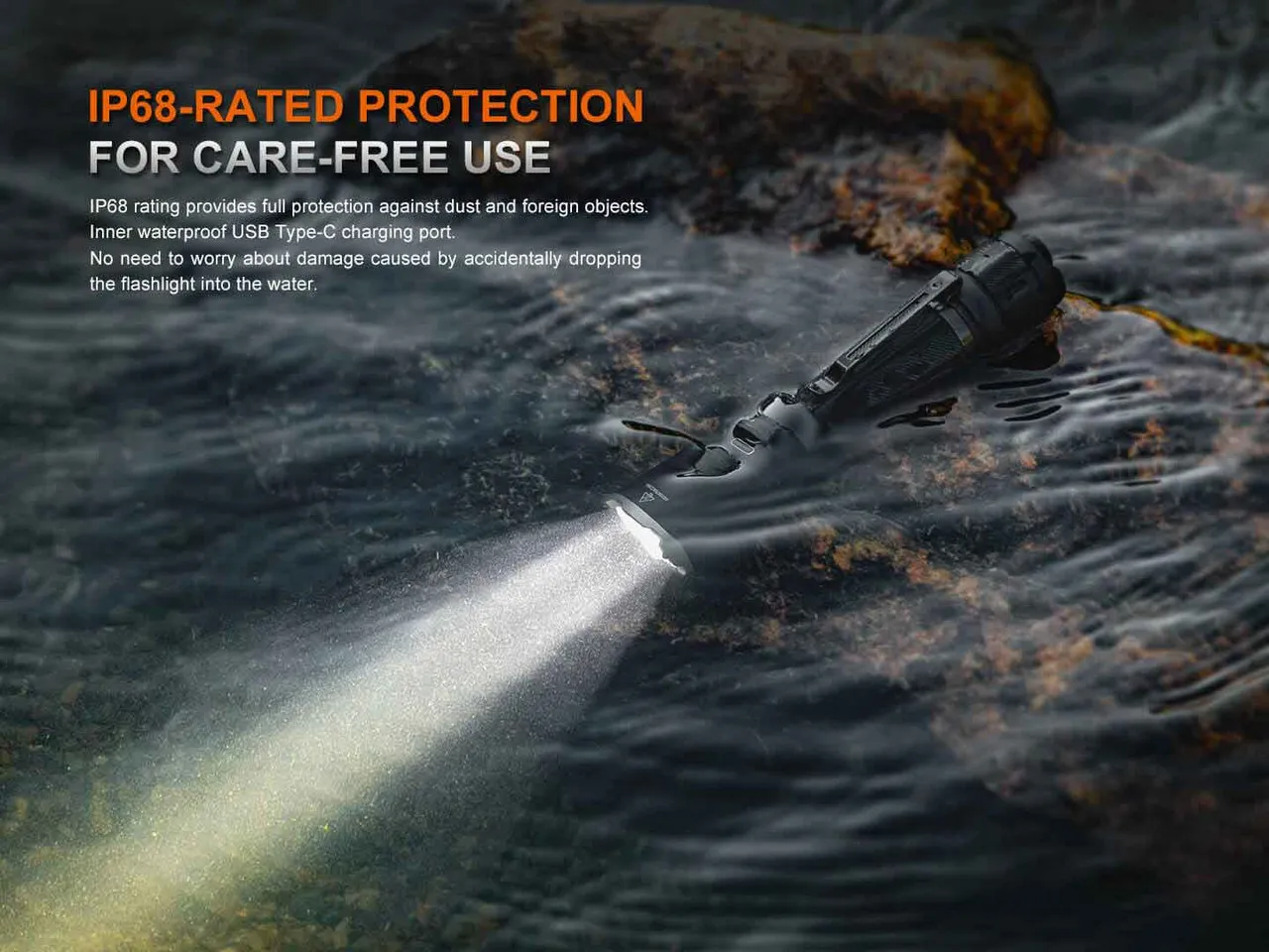 Fenix TK21R 3600 Lumens 480 metre Tactical LED Rechargeable Torch submerged in water, showing IP68 protection.