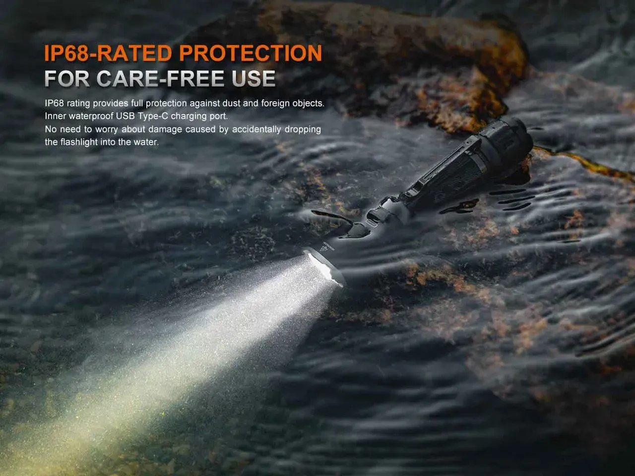 Fenix TK21R 3600 Lumens 480 metre Tactical LED Torch + Free T5 Pen submerged in water, demonstrating IP68 protection.
