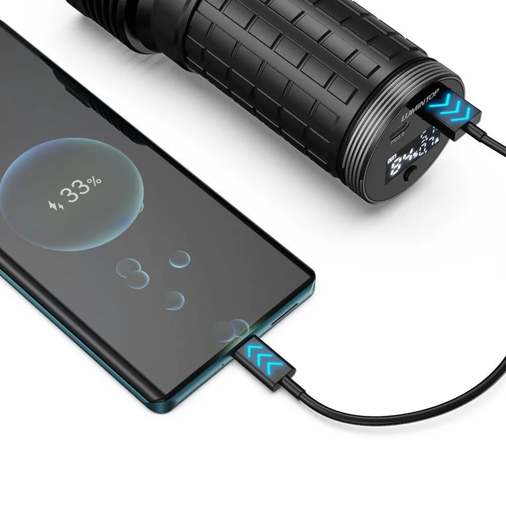 Lumintop Mach 4695 Compact 26000 lumen 520m throw rechargeable torch charging a smartphone via USB-C.
