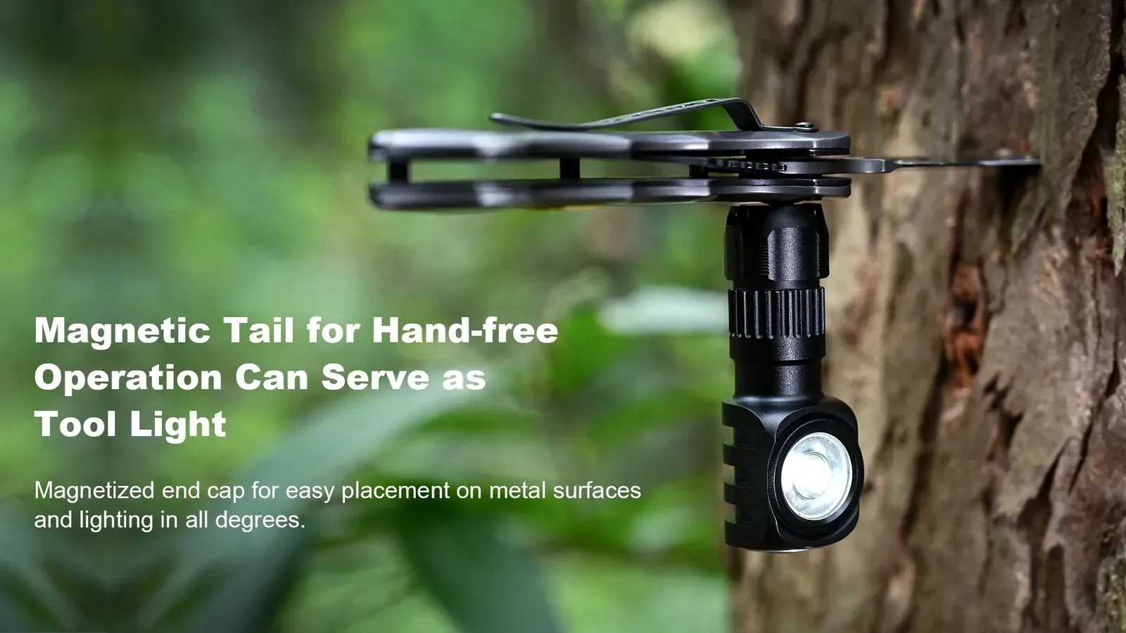 Wuben H5 headlamp magnetically attached to a tree trunk, demonstrating its magnetic tail for hands-free use.