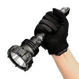 Gloved hand holding the Acebeam P20 - 1454m 5600 Lumen Long-Range LED Thrower, demonstrating its size.
