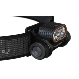 Close-up side view of the black Fenix HM55R 1200 Lumen Lightweight Multi-LED Rechargeable Headlight on its band.