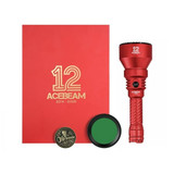 Acebeam T29 red flashlight kit with green filter, commemorative coin, and anniversary booklet.