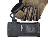 Gloved hand holding the Acebeam X35 powerful black flashlight from a top-down perspective.