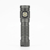 Skilhunt M150 4 flashlight in dark grey, shown from the front, highlighting the LED head and textured body.
