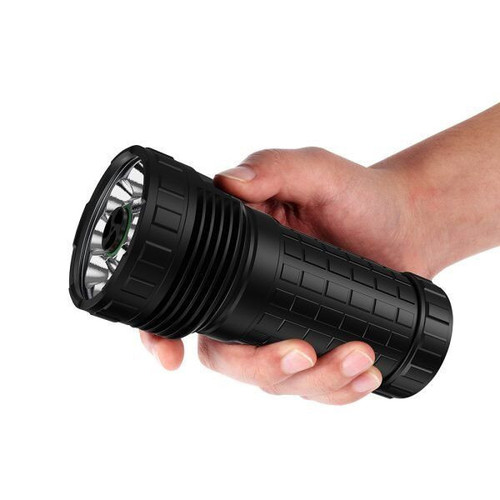 Lumintop Mach 4695 Compact 26000 lumen 520m throw rechargeable torch held in a hand for scale.