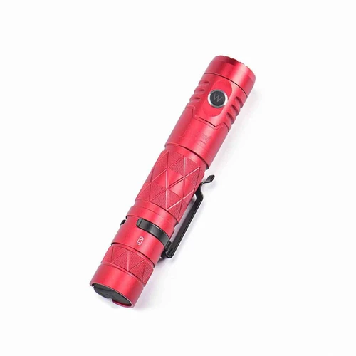 Red Wuben E12R flashlight viewed at an angle, highlighting the textured grip and pocket clip.