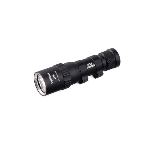 Weltool LH8 W35 flashlight with a bright lens, shown at an angle on a white background.