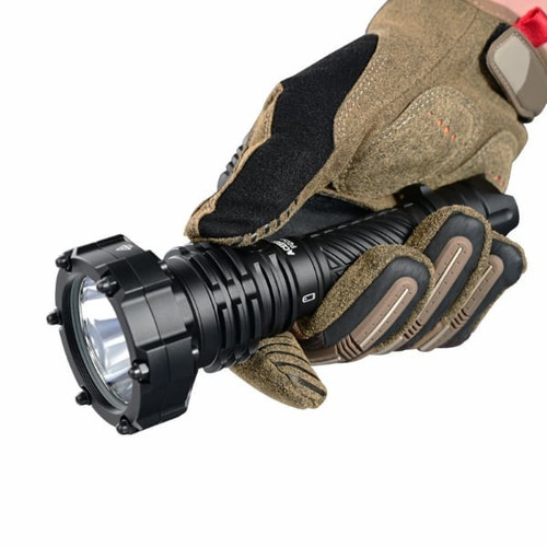 Gloved hand holding the Acebeam P20 Mini long distance tactical flashlight, showing its ergonomic grip.