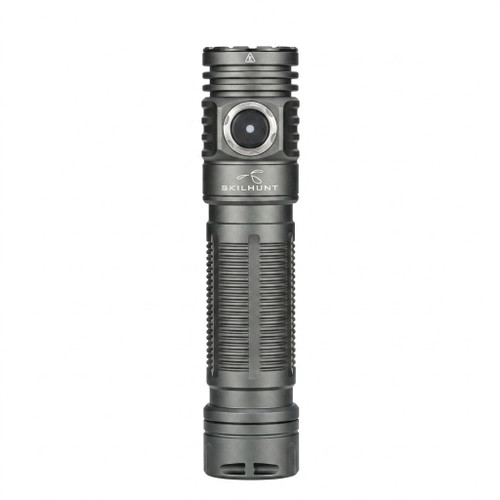 Skilhunt M200 LED flashlight standing upright, showing its front view and magnetic tailcap.