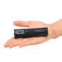The Lumintop Apollo V2 High CRI 1300 lumen rechargeable torch lying flat in an open hand.