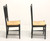 SOLD - Late 20th Century Distressed Black Cottage Style Dining Side Chairs with Rush Seats - Pair C
