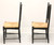 SOLD - Late 20th Century Distressed Black Cottage Style Dining Side Chairs with Rush Seats - Pair B