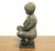 SOLD - Patinated Bronze Seated Boy Holding Fish Sculpture