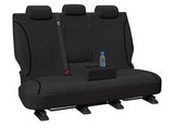 Black Tradies poly canvas rear seat cover with armrest allowance fitted to Mitsubishi Triton MV and Nissan Navara D27 MY26 rear bench