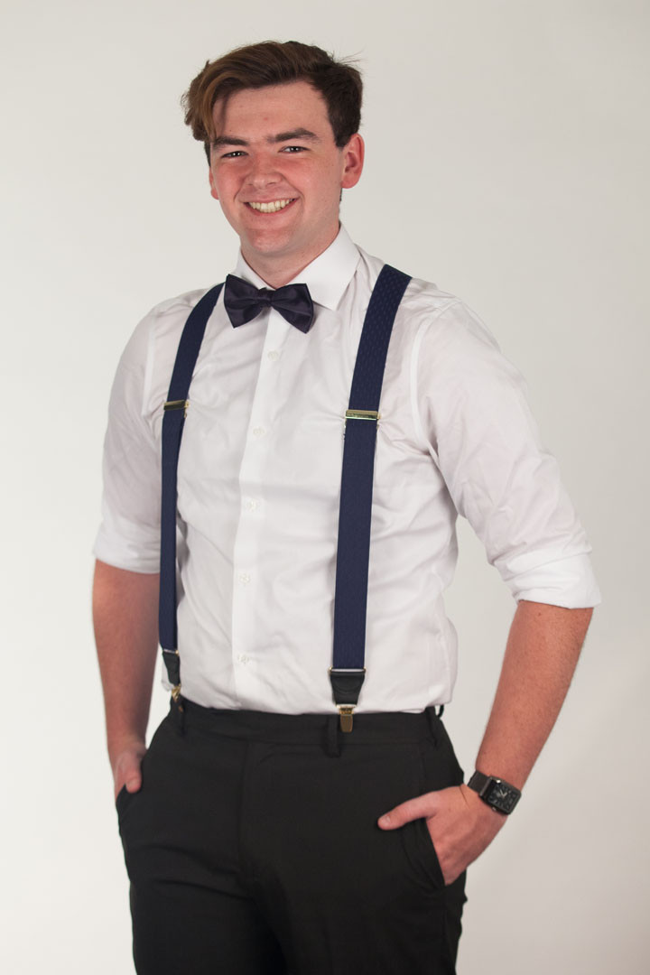 Model Wearing Navy Blue Jacquard Suspenders - Petite Diamonds Clip Front View