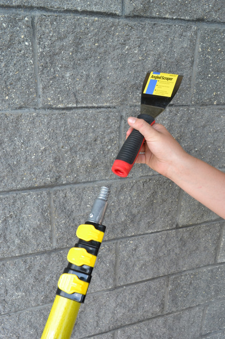 Screw the angled scraper onto the extension pole (Sold Separately)