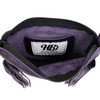 Inside of purple embossed leather fringe purse. 