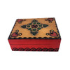 Side of wooden box with shapes and hearts. 