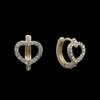 14kt. gold plated heart huggie hoop earrings with CZ crystals on black background.  